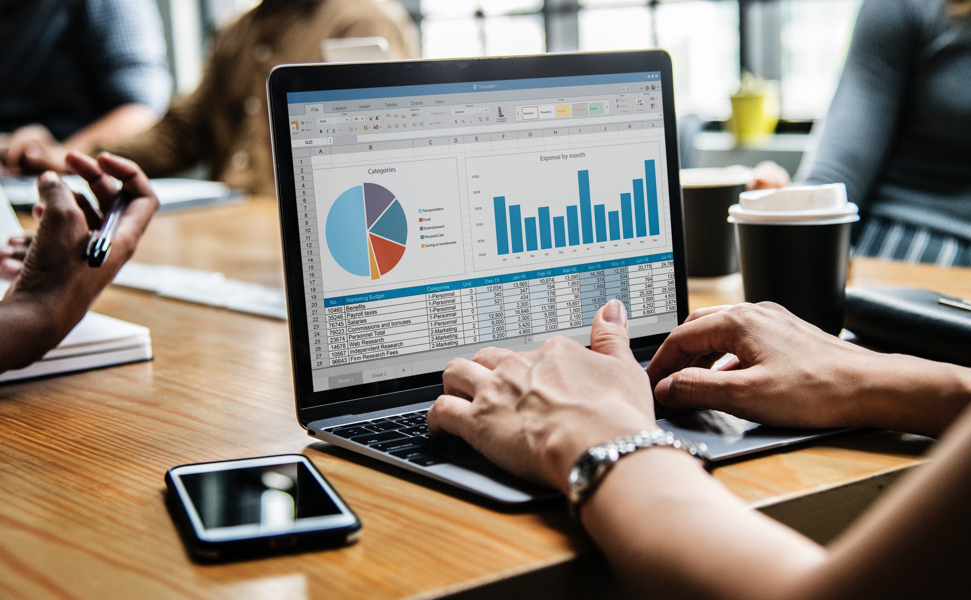 Graphs and tables on computer screen generated by machine learning